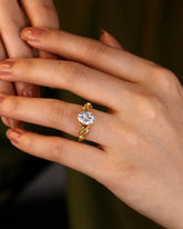 SENNA Crossed Leaves Oval Moissanite Engagement Ring